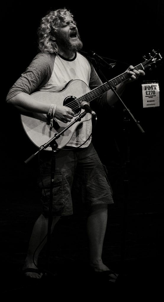 Adrian Lancini on guitar